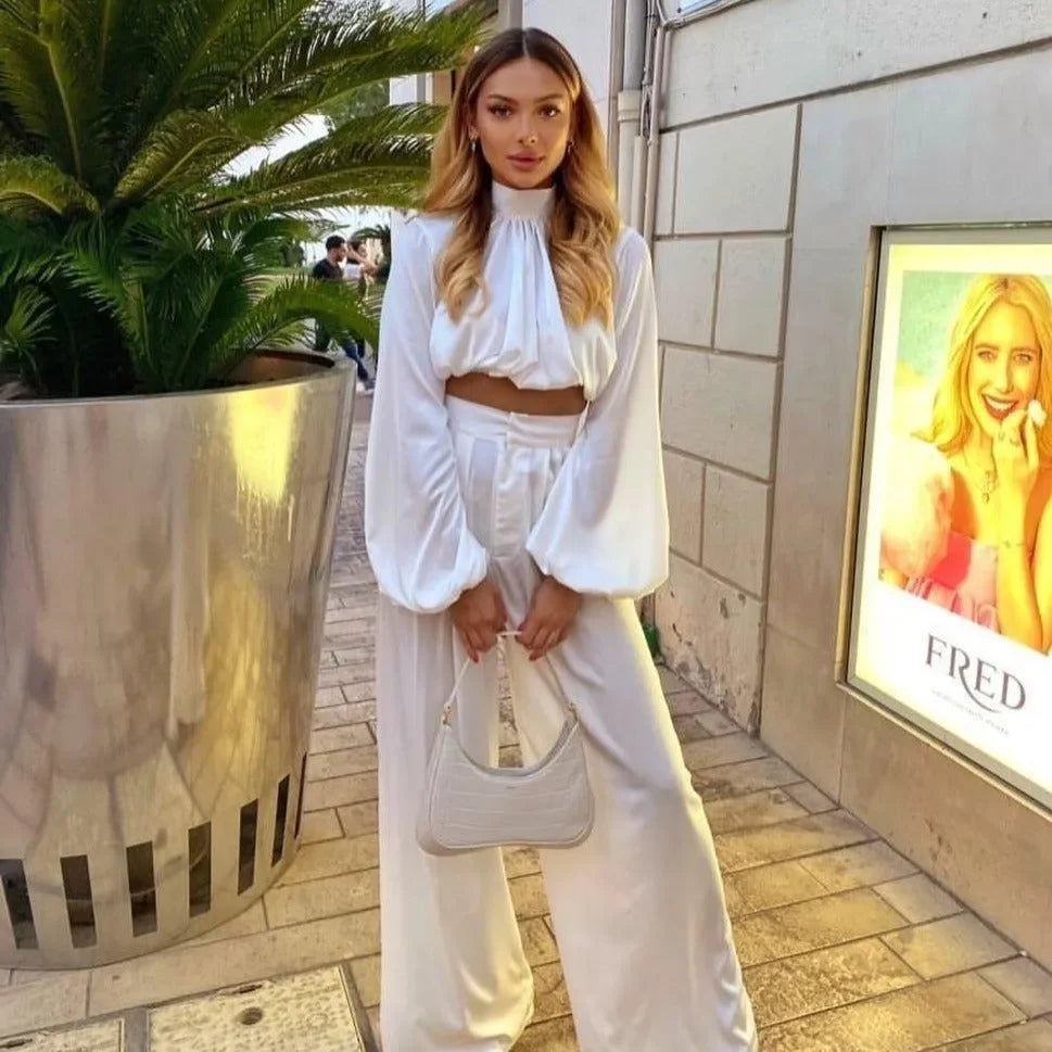white long-sleeve crop top and wide-leg trousers co-ord, evening look