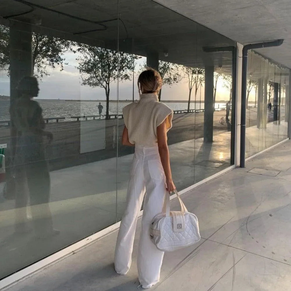 knit sleeveless top with wide-leg trousers, casual chic look