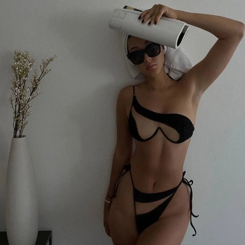black cut-out bikini with one-shoulder design