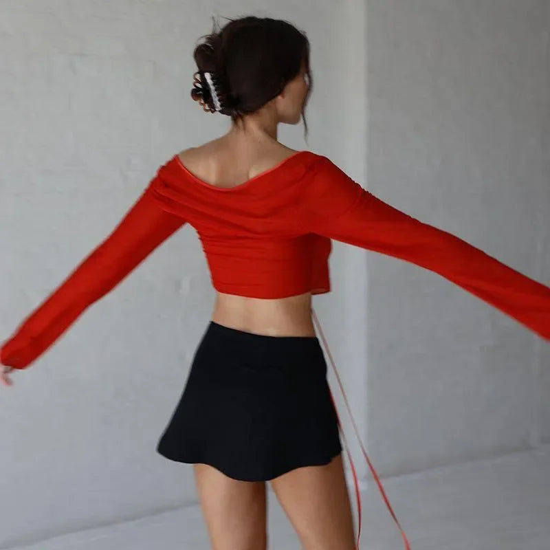 off-shoulder long-sleeve crop top and black mini skirt, casual day look