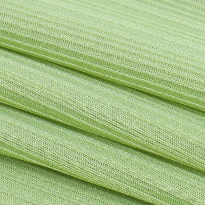 Pale green ribbed knit fabric.