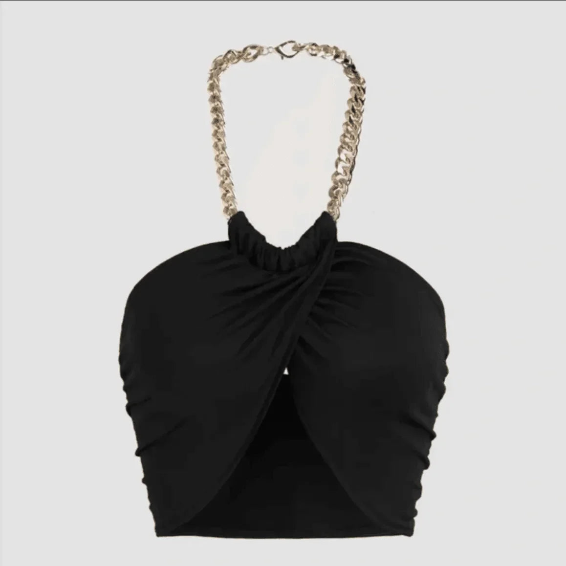 Black ruched halter top with chain strap for evening wear.