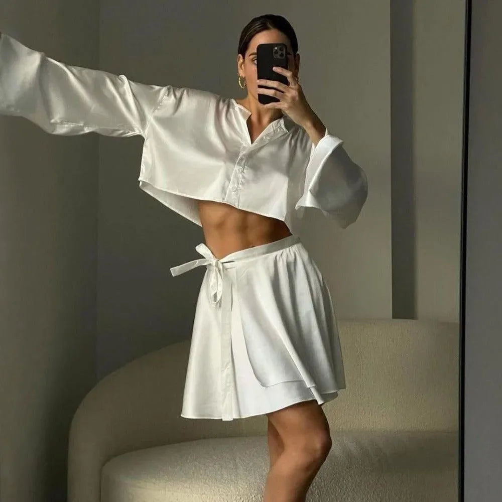 white satin co-ord set with cropped top and tie-waist skirt