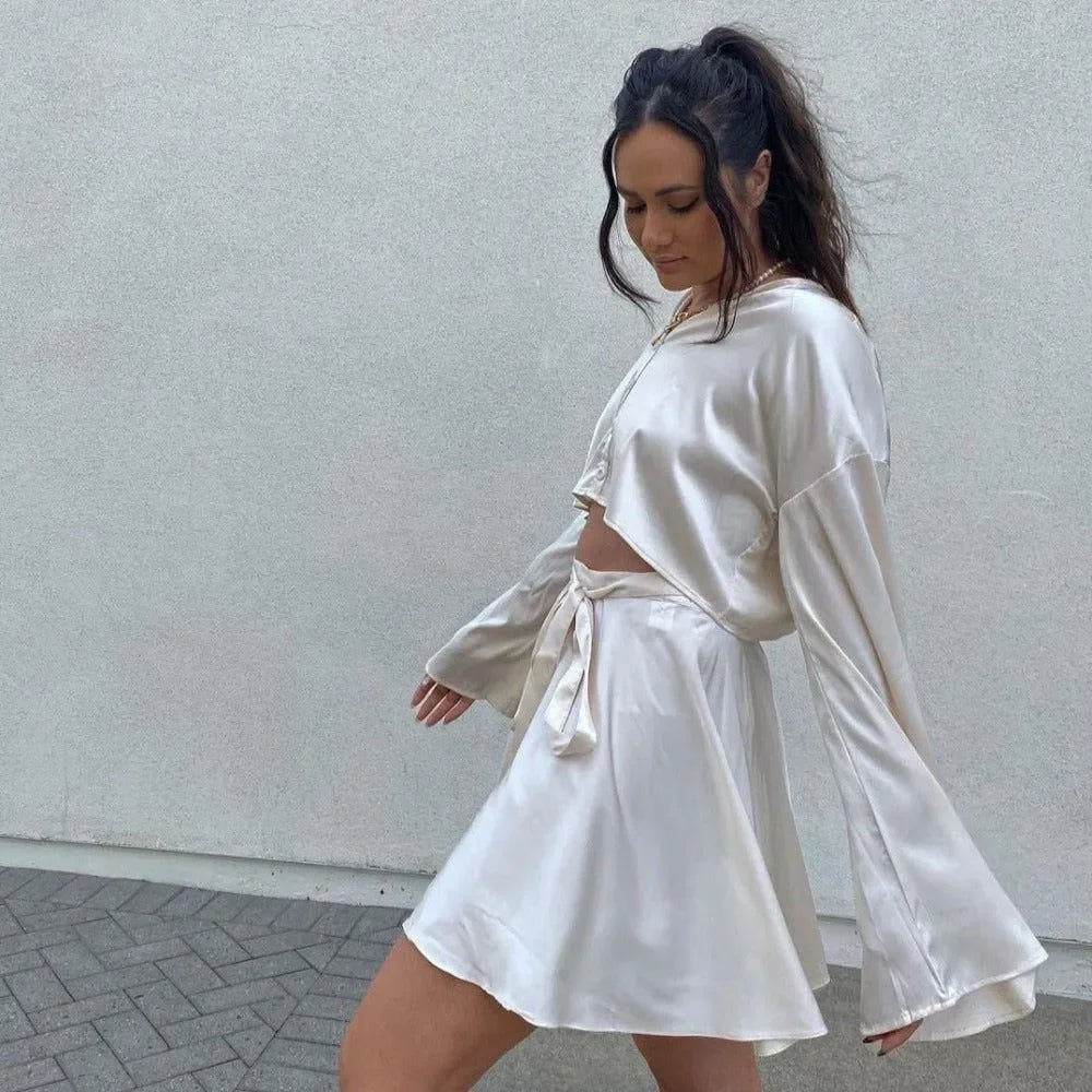 Satin co-ord with bell sleeves and tie waist, perfect for an evening look.