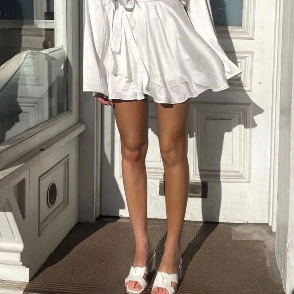 white satin mini dress with long sleeves, casual daytime look