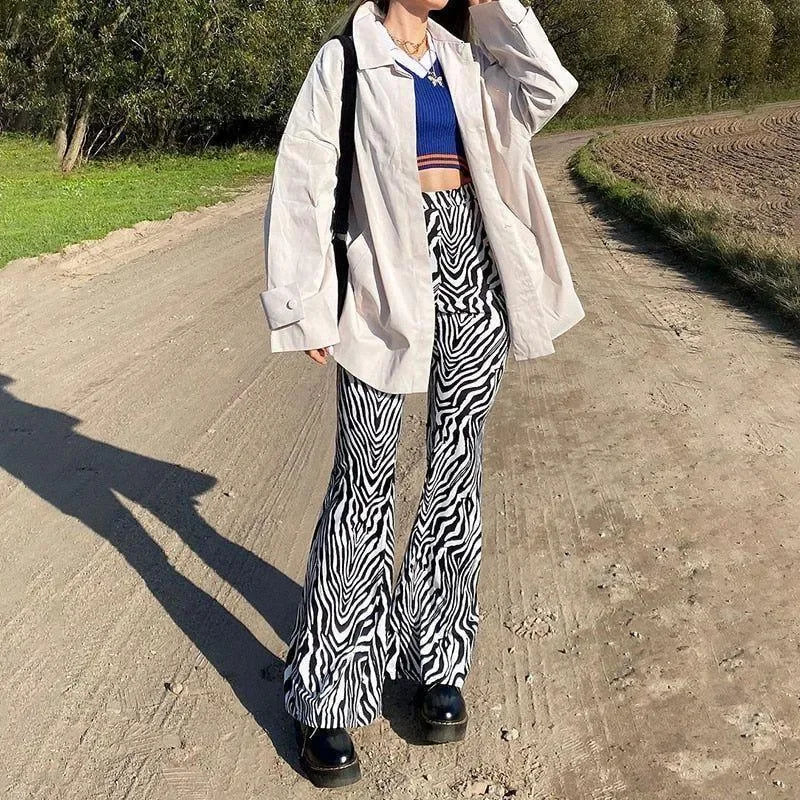 zebra print flared trousers with oversized beige shirt, casual street style