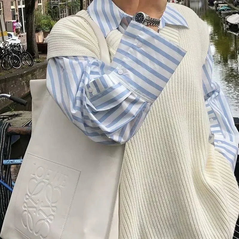 striped button-up shirt with knitted sweater vest, casual tote bag
