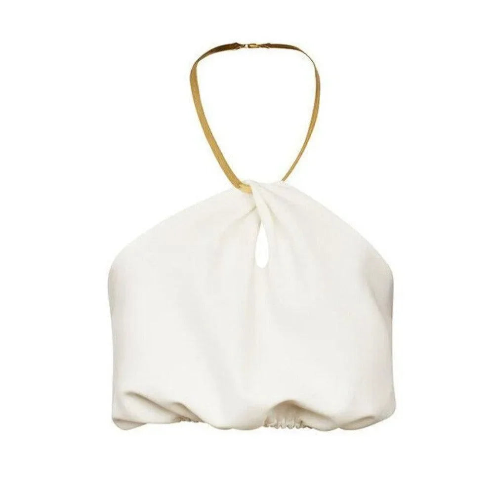halter-neck white top with gold strap
