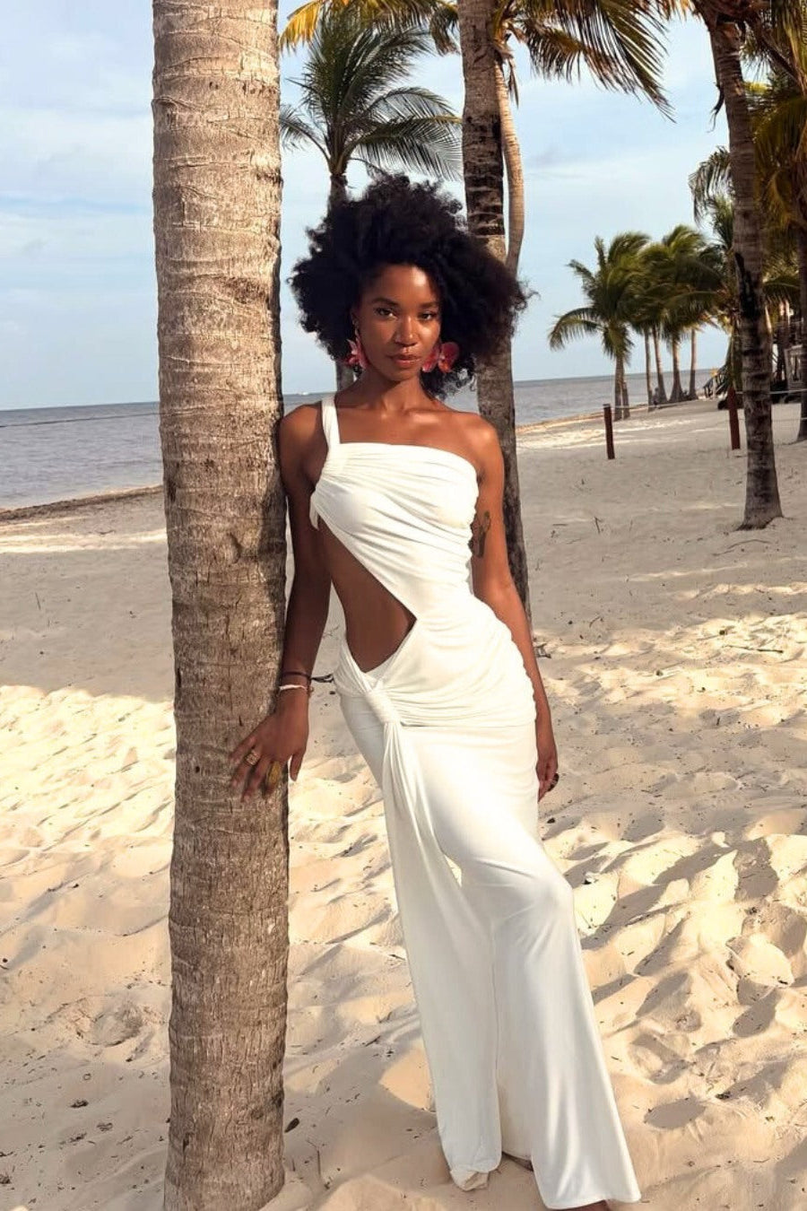 Caprice white cut-out maxi dress with one-shoulder design and ruched hip, front view