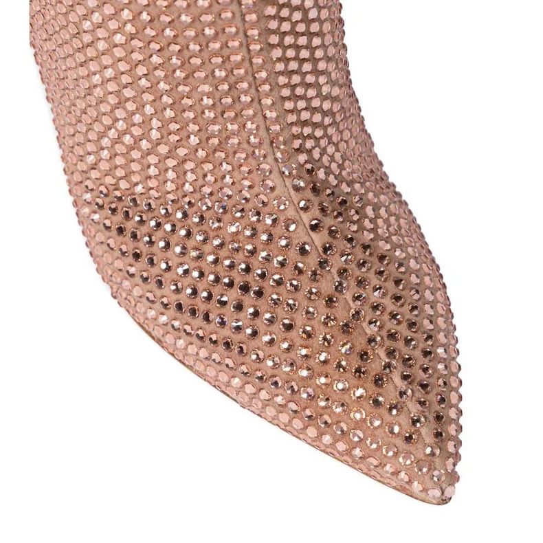 Close-up of a rose gold stiletto heel with rhinestone embellishments on a white background