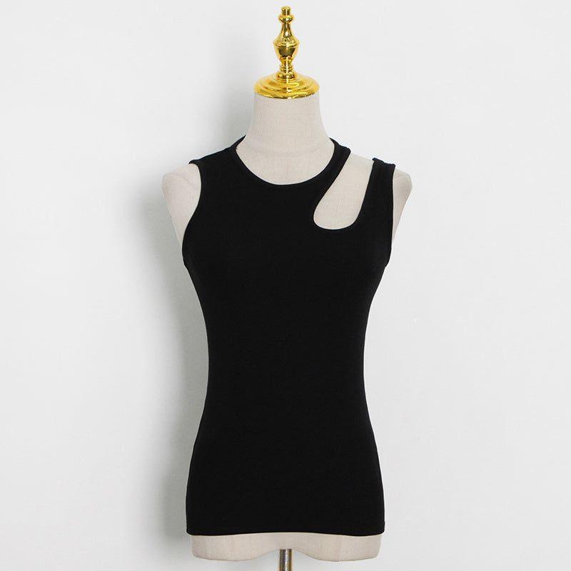 Black tank top on a mannequin with a white background