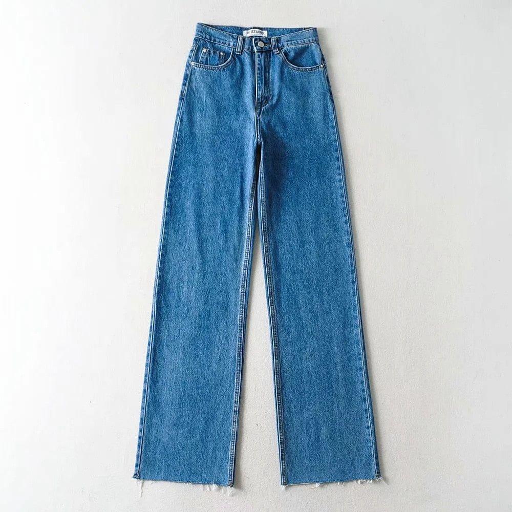 Blue jeans on a light gray background
