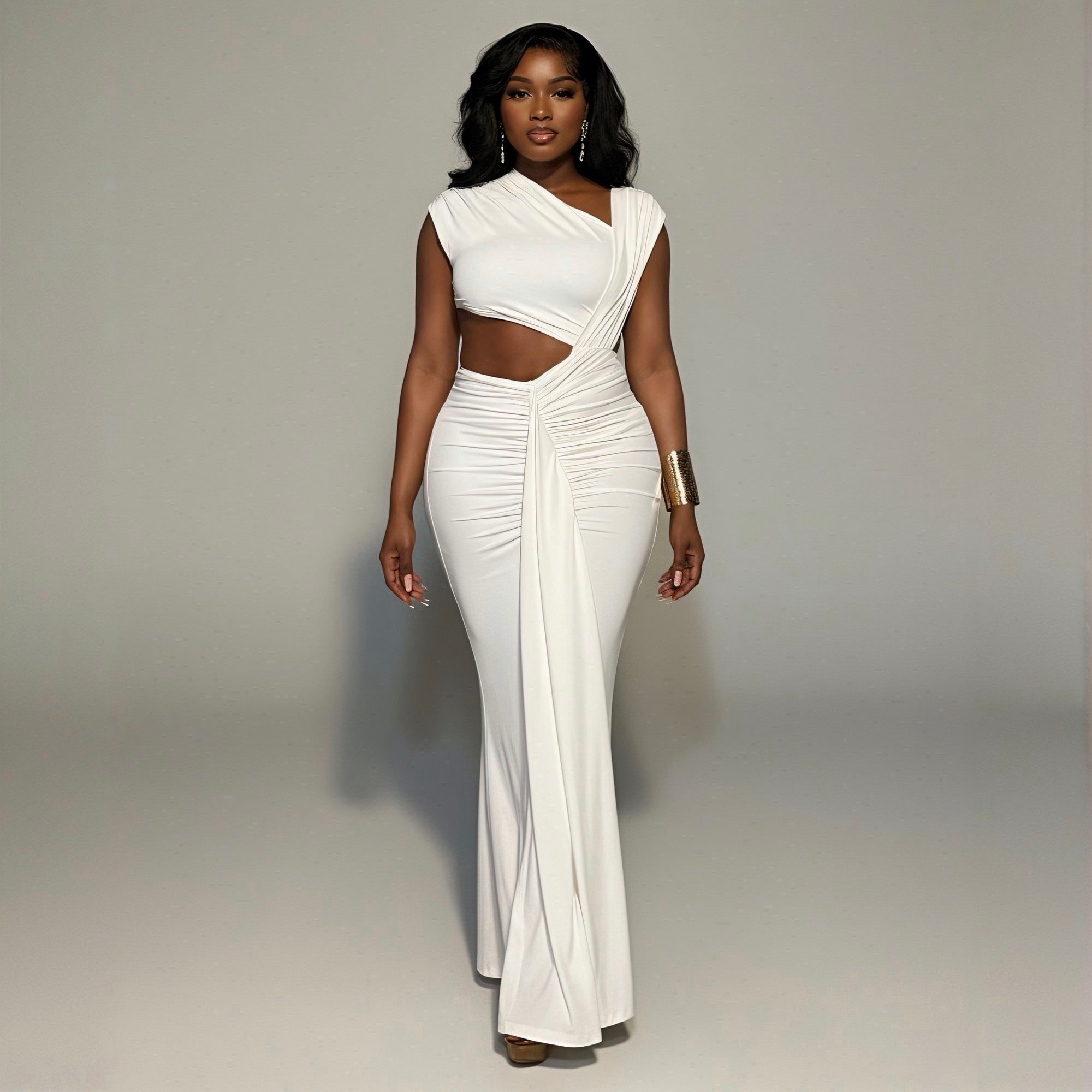 Woman wearing a white evening gown against a gray background