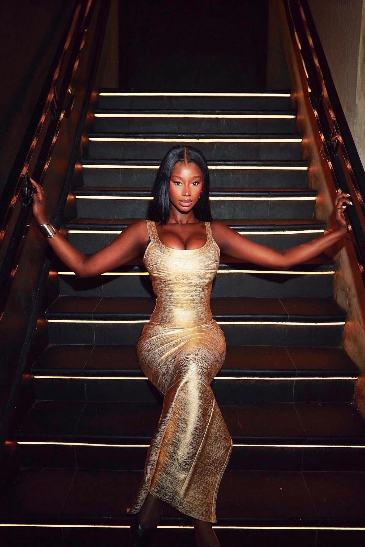 Iconic Angle gold metallic maxi dress, close-up of scoop neckline and wide straps