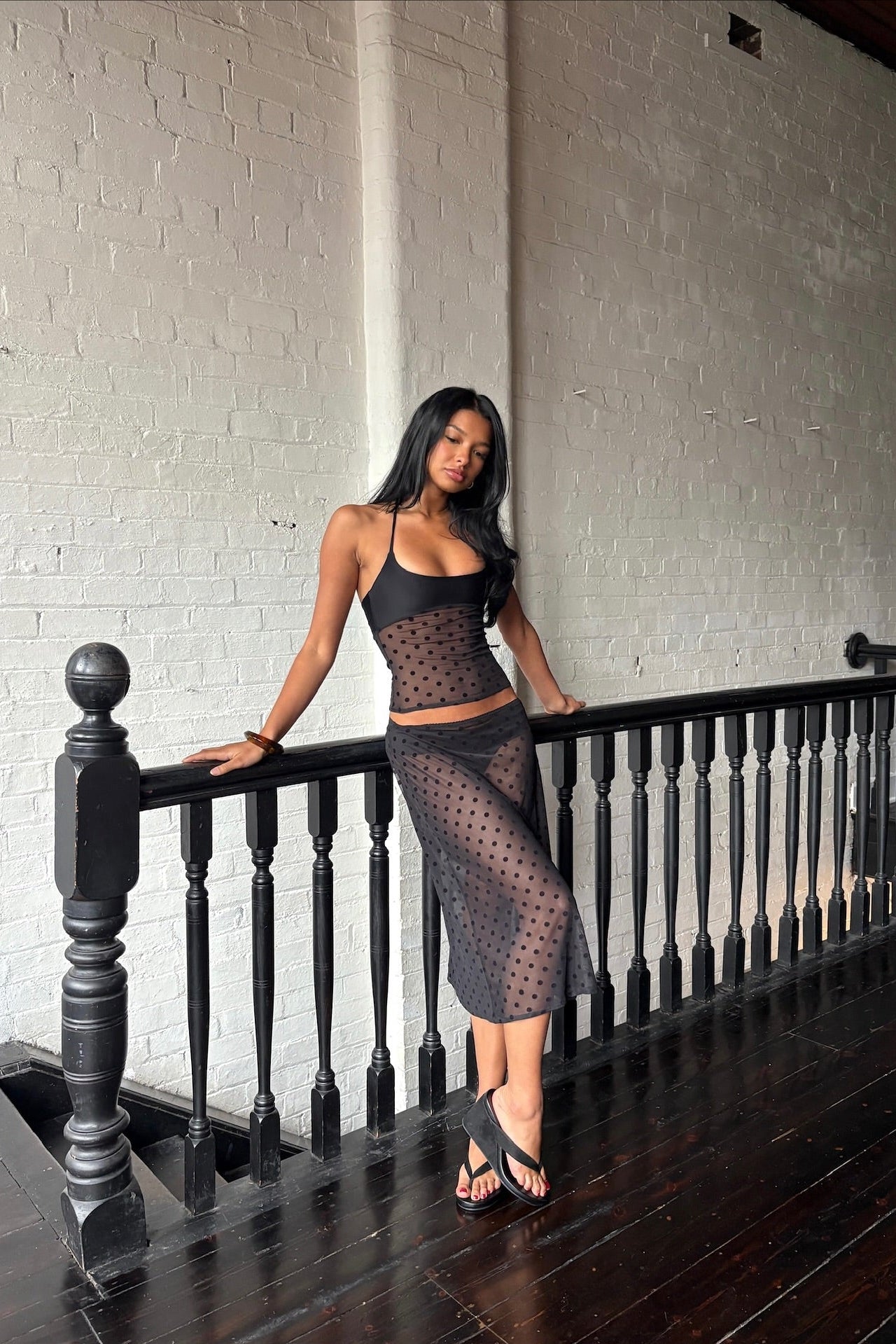 Black polka dot mesh two piece set, full-length editorial shot