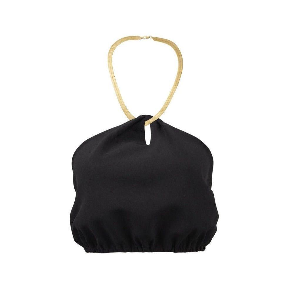 Black halter top with gold straps on a white background