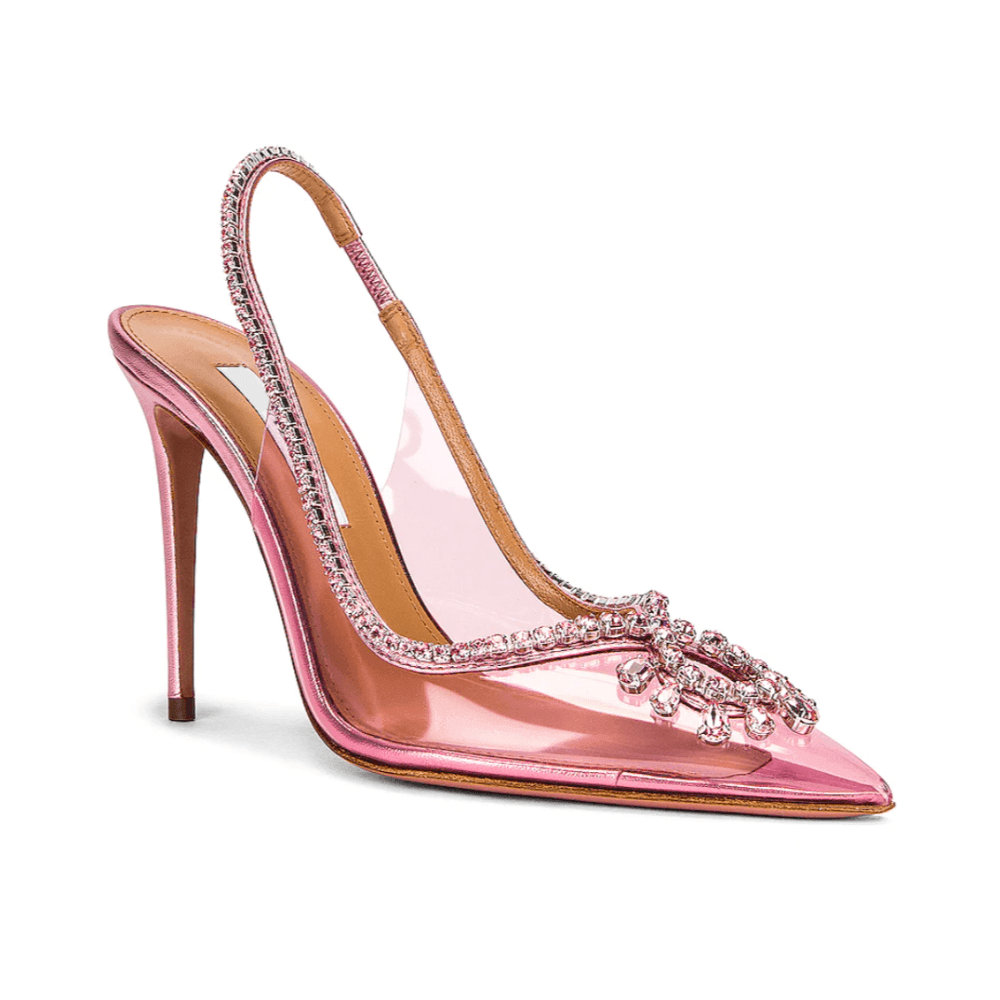 Pink high-heeled shoe with embellishments on a white background