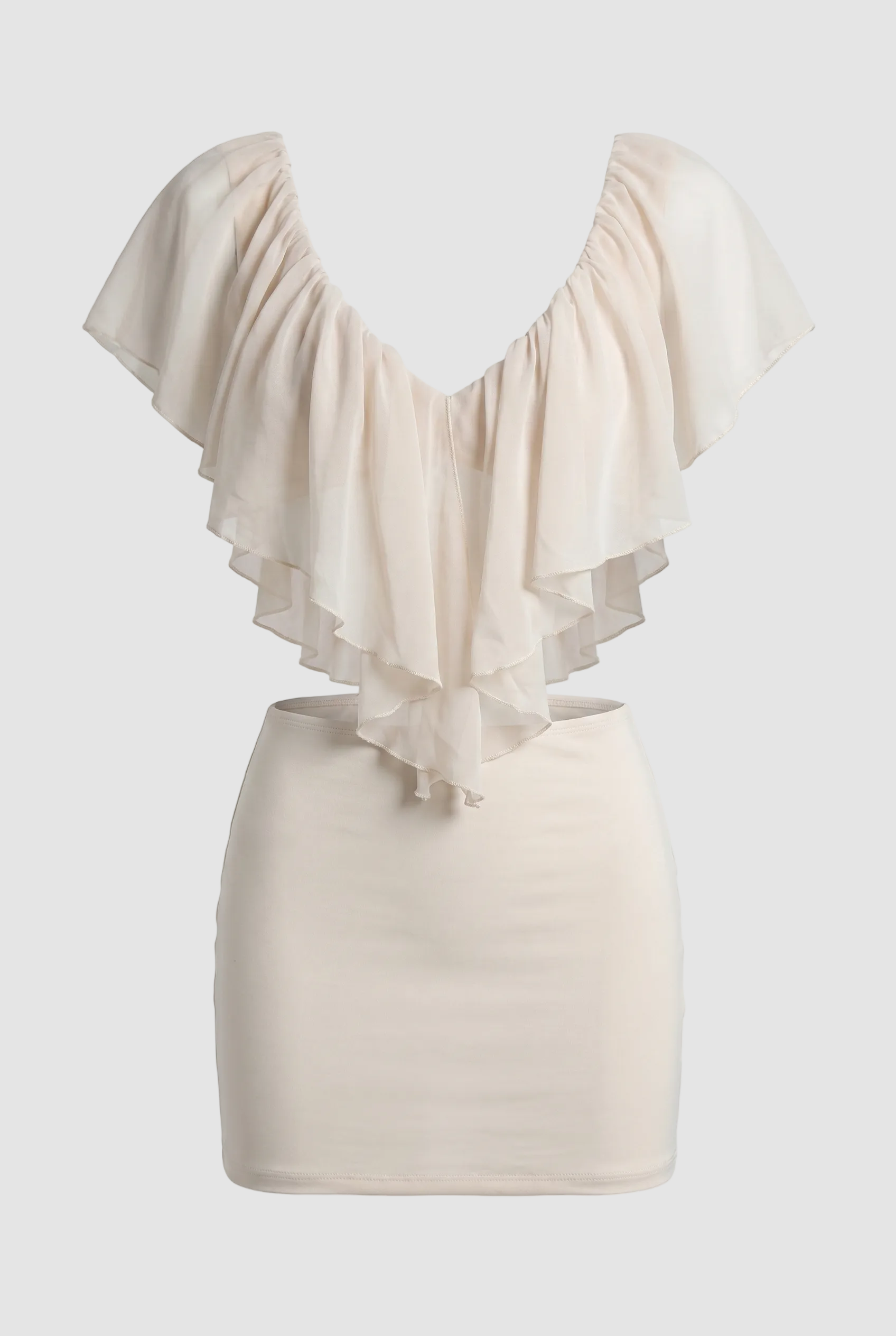 Close-up of chiffon ruffle and side cut-out on ivory two-piece set
