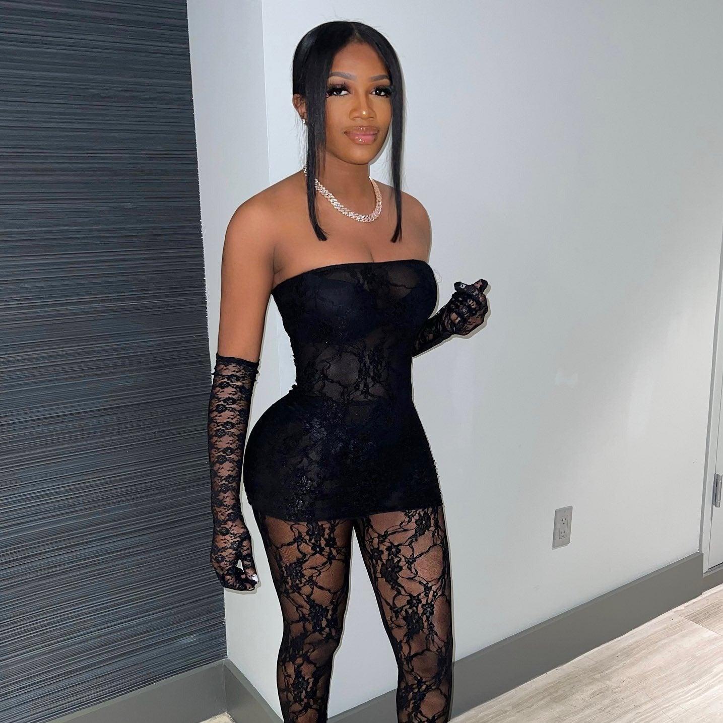 Black lace strapless mini dress with matching gloves and tights, elegant evening outfit