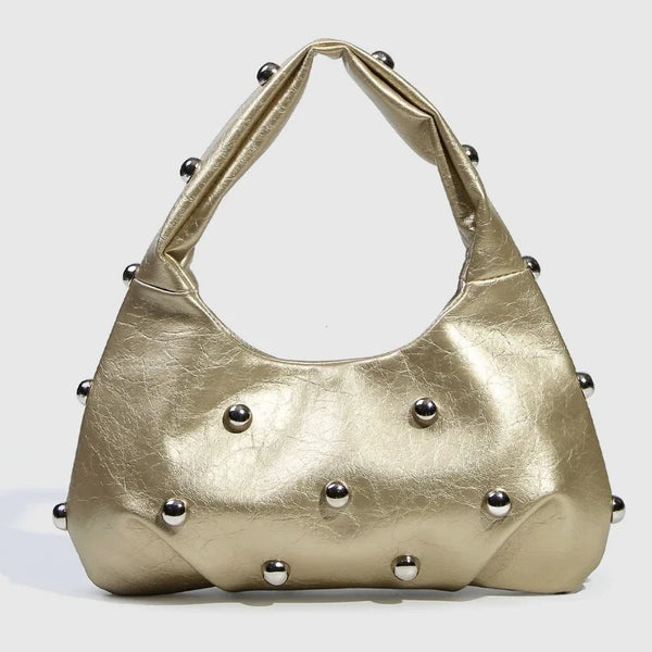 Gold metallic handbag with stud embellishments, statement accessory