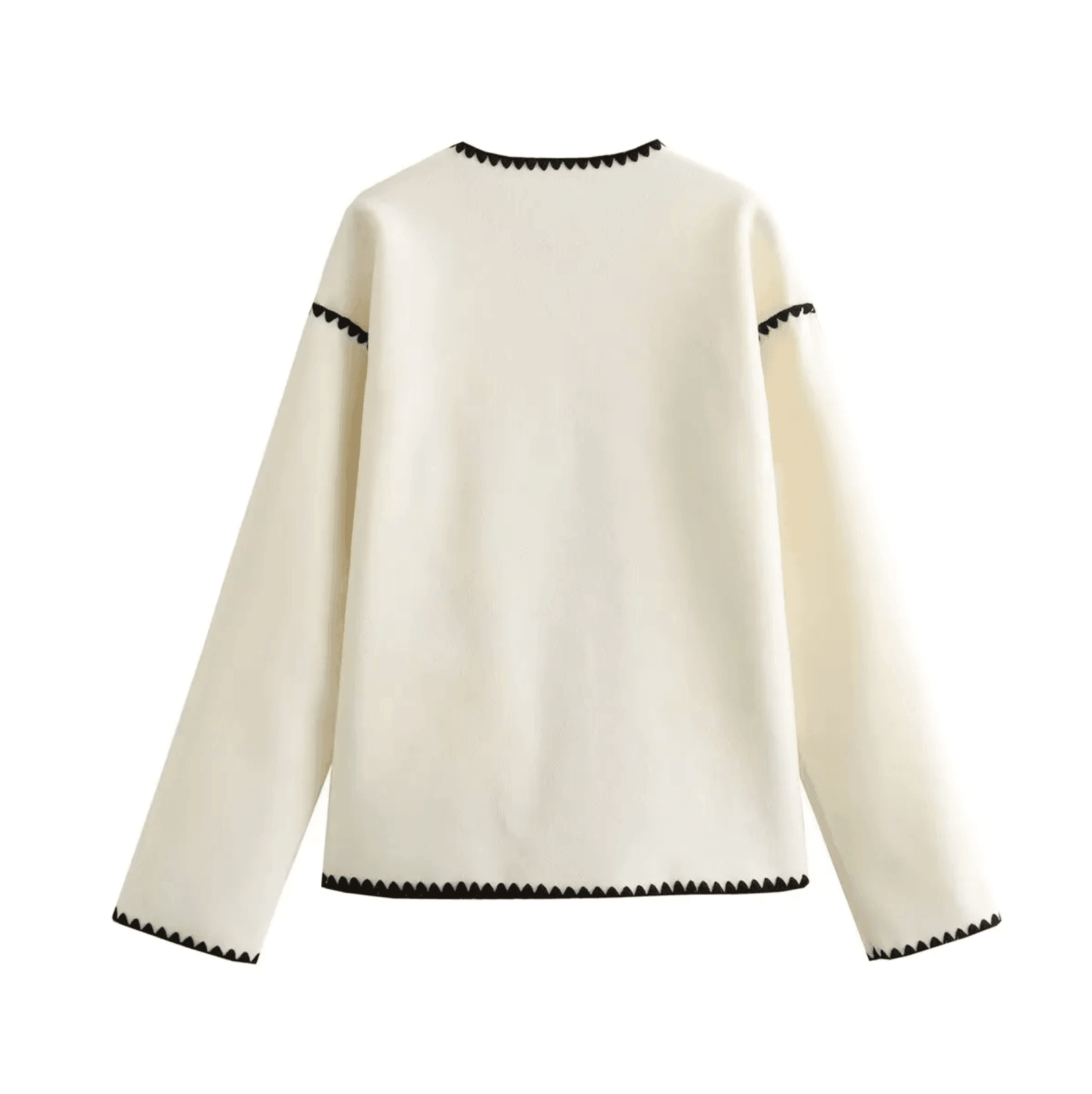 Cream long-sleeve top with black scalloped trim, versatile casual piece
