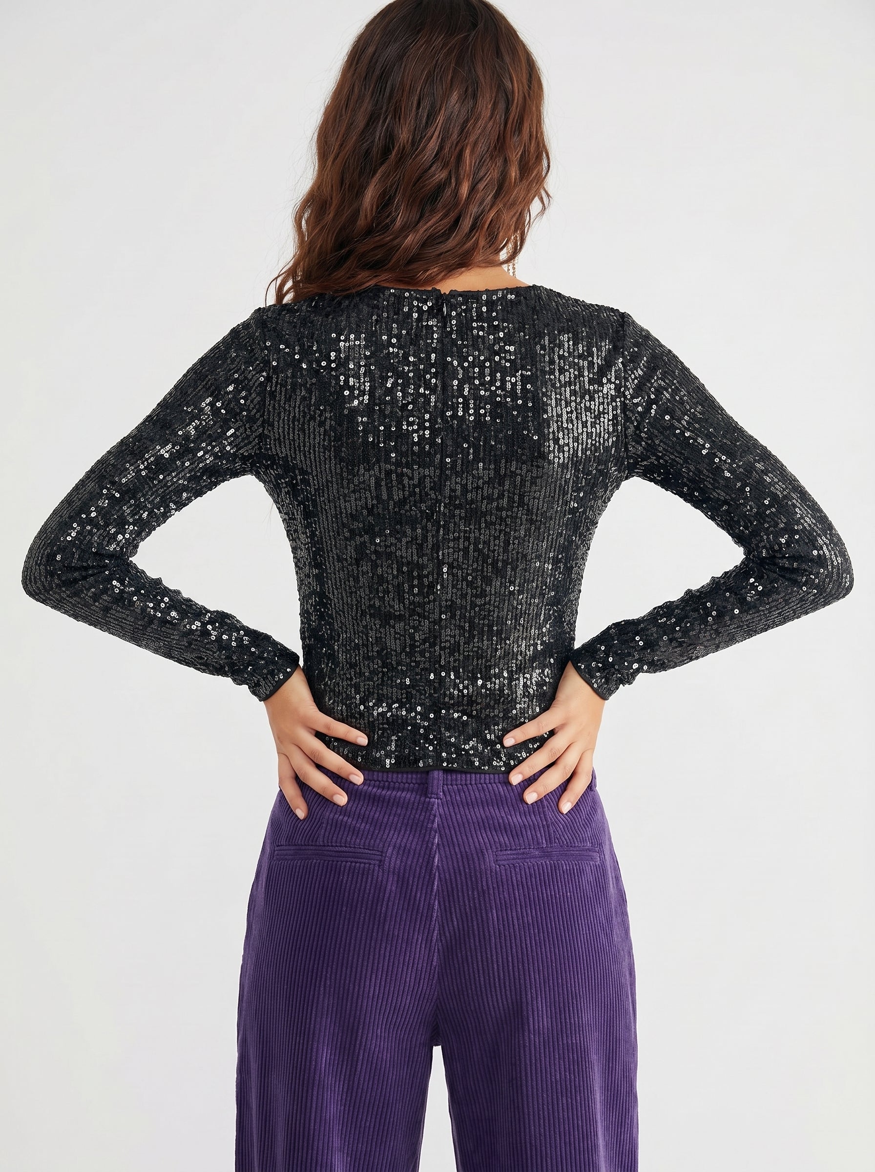 Sequin long-sleeve crop top, perfect for a night-out party look.