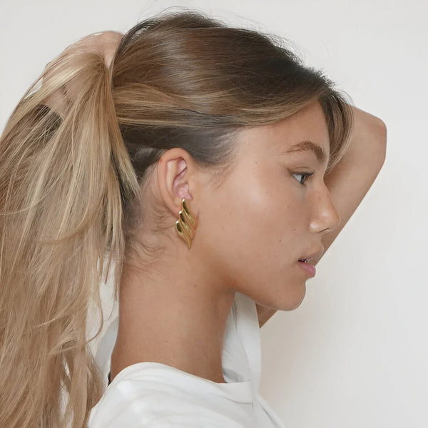 Gold abstract earrings, stylish accessory piece