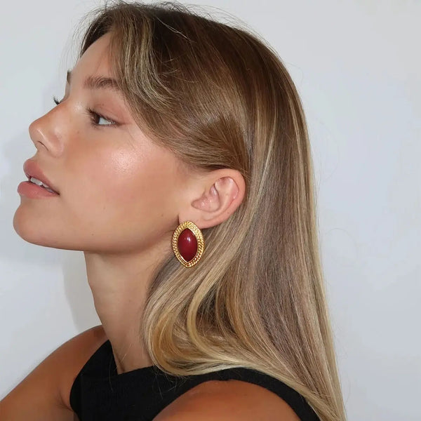 gold and red statement earrings