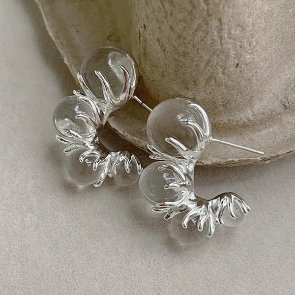 silver statement earrings with clear bubble design