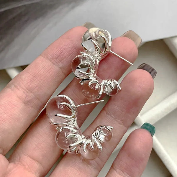 clear bubble hoop earrings with metallic accents