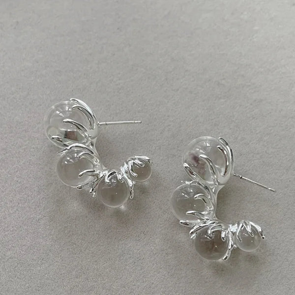 silver earrings with transparent bubble design