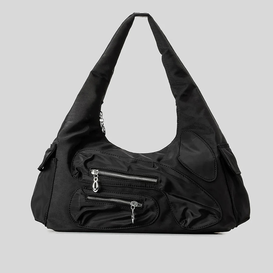 black shoulder bag with multiple zippered pockets