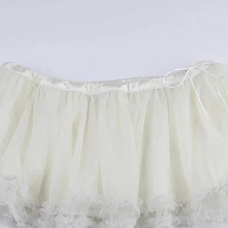 Love Nest Mesh Pleated Mini Skirt in White - Mermaid Way
