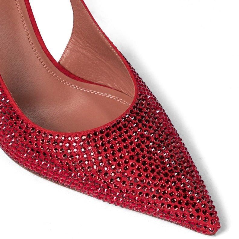 Red sequin shoe on a white background