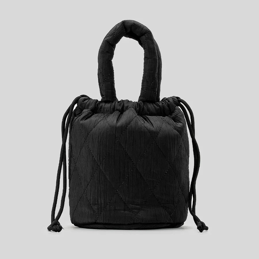Black quilted drawstring bag with handles.