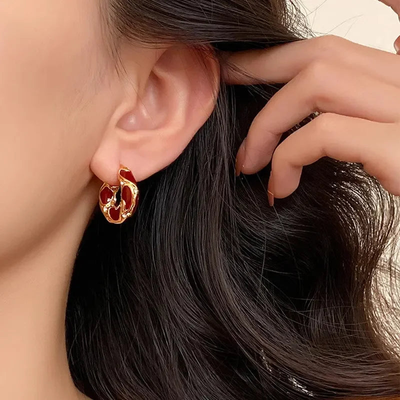 abstract gold earrings, statement accessory