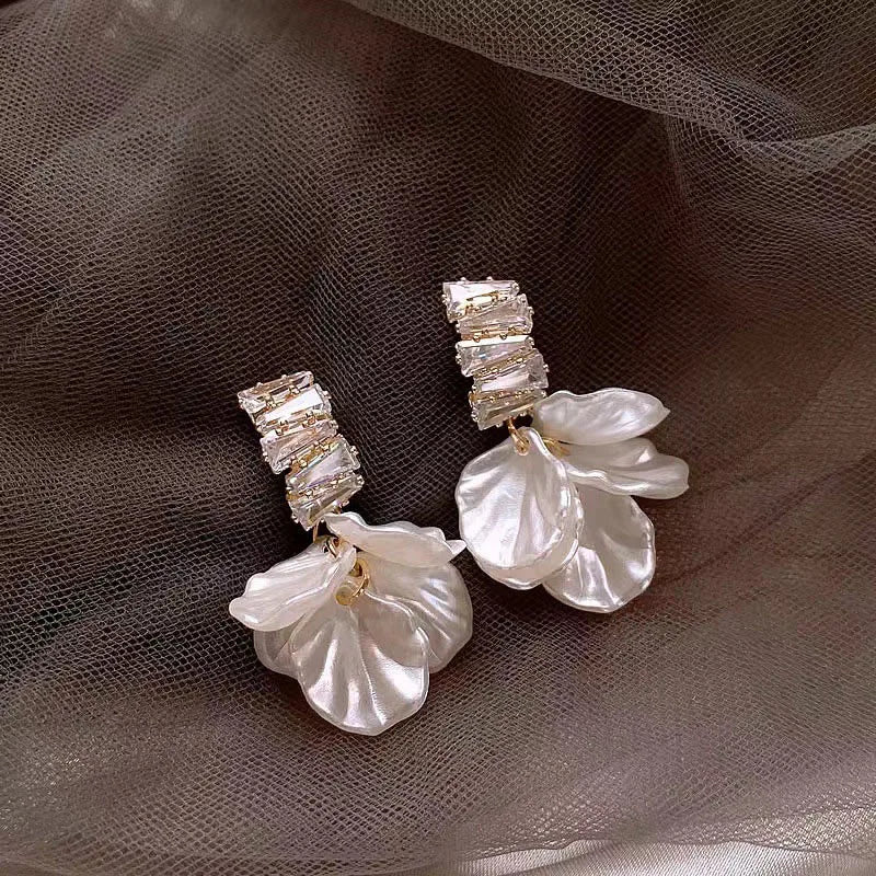 crystal and pearl drop earrings with floral design