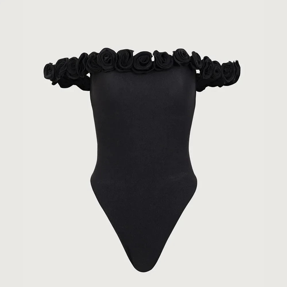 black off-the-shoulder bodysuit with floral details, party outfit