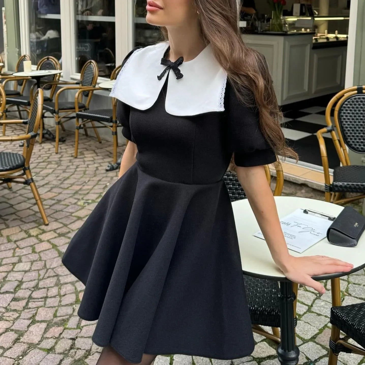 black dress with white Peter Pan collar, casual day look