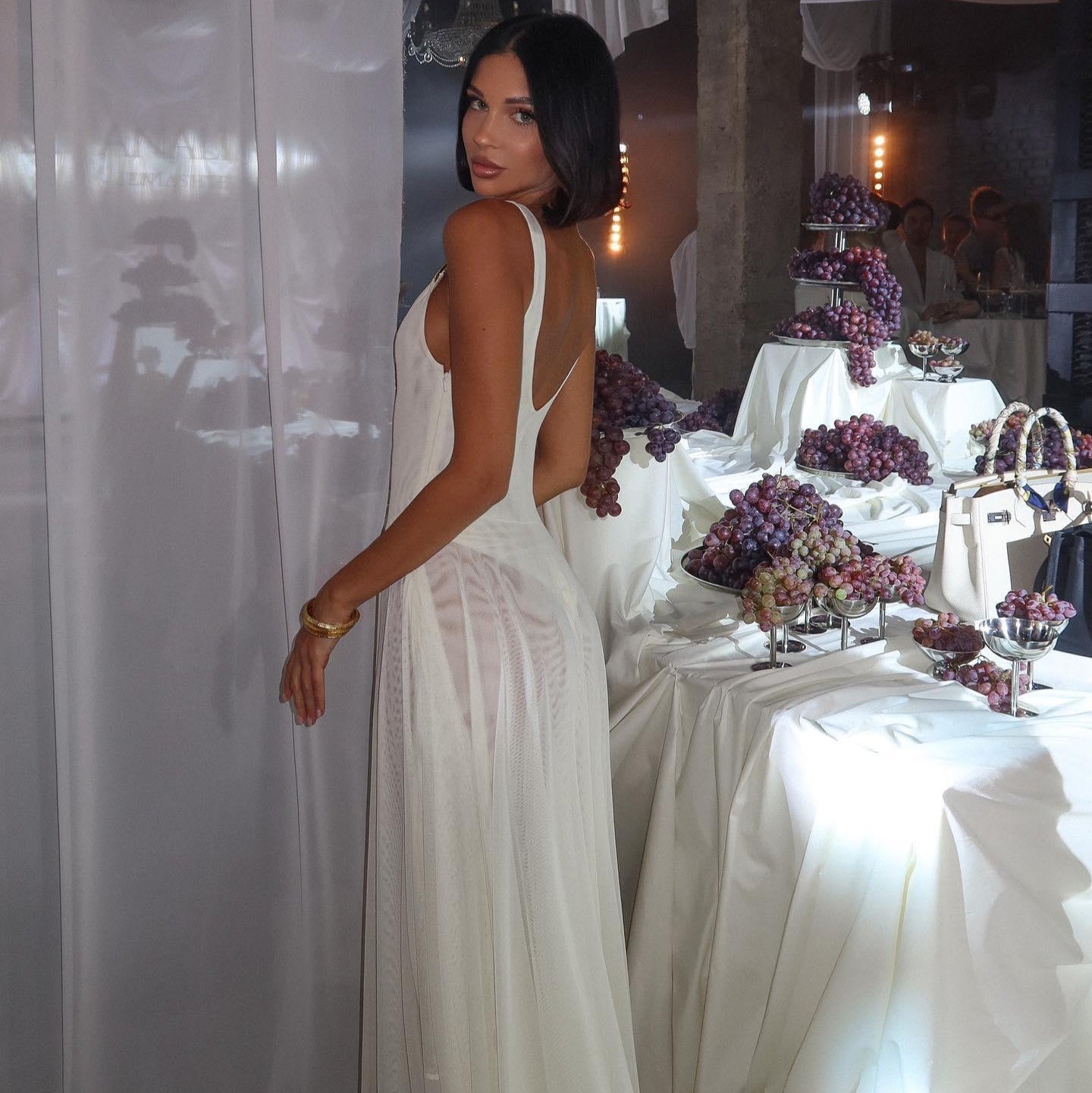 backless maxi dress with sheer panels, evening wear