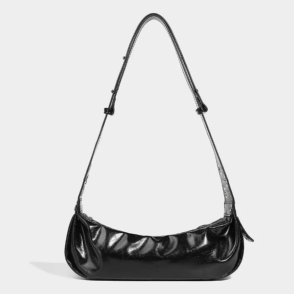 Black glossy shoulder bag with ruched details.