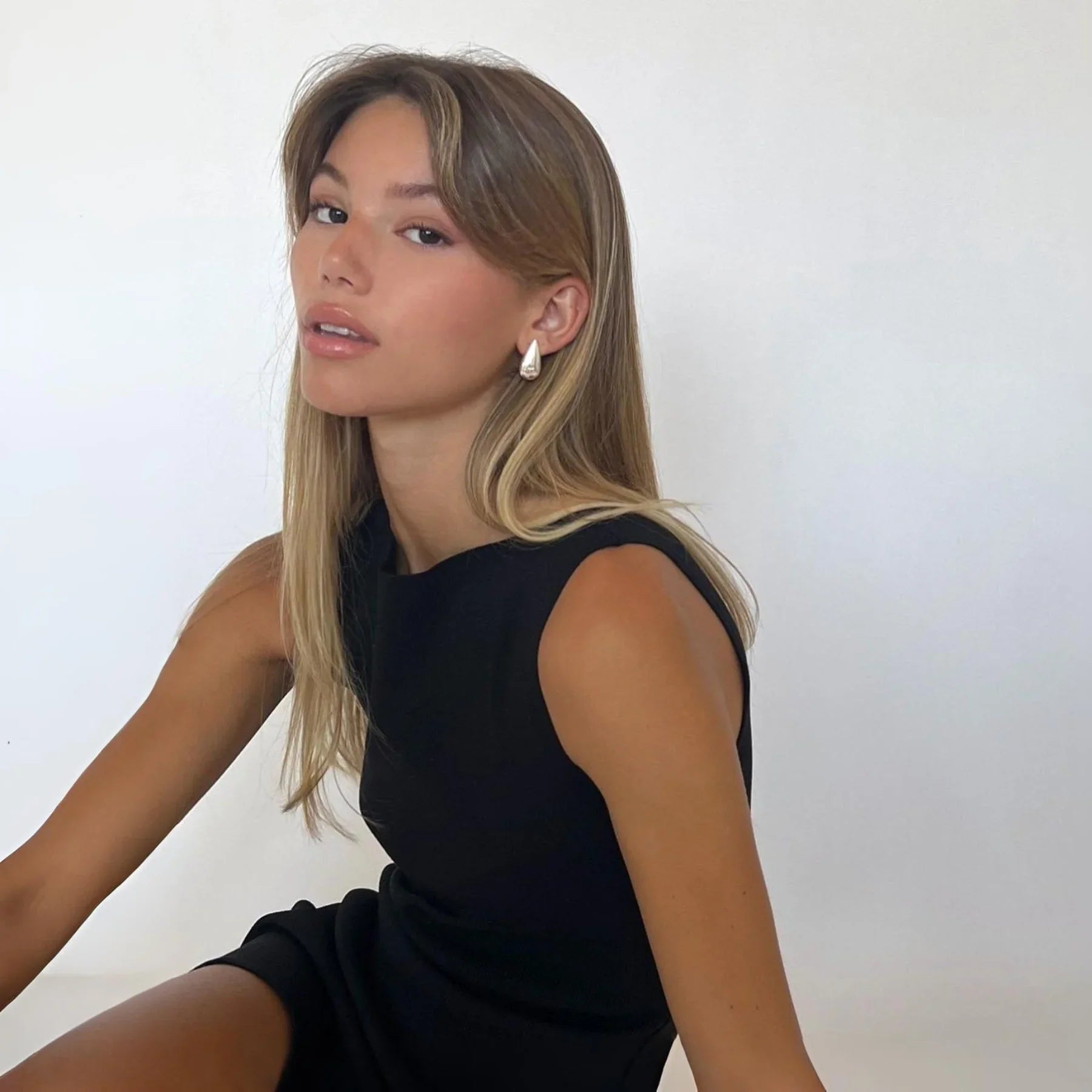 black sleeveless mini dress, classic style