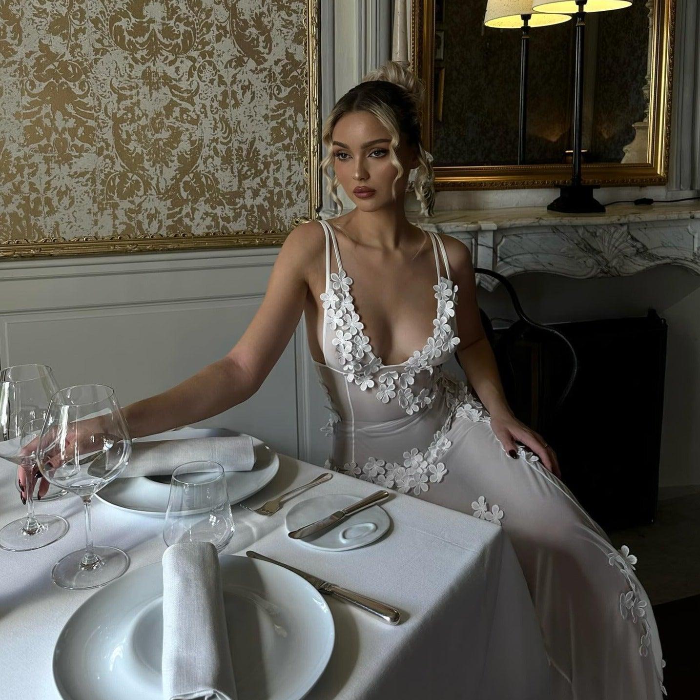 Floral applique sheer evening dress.