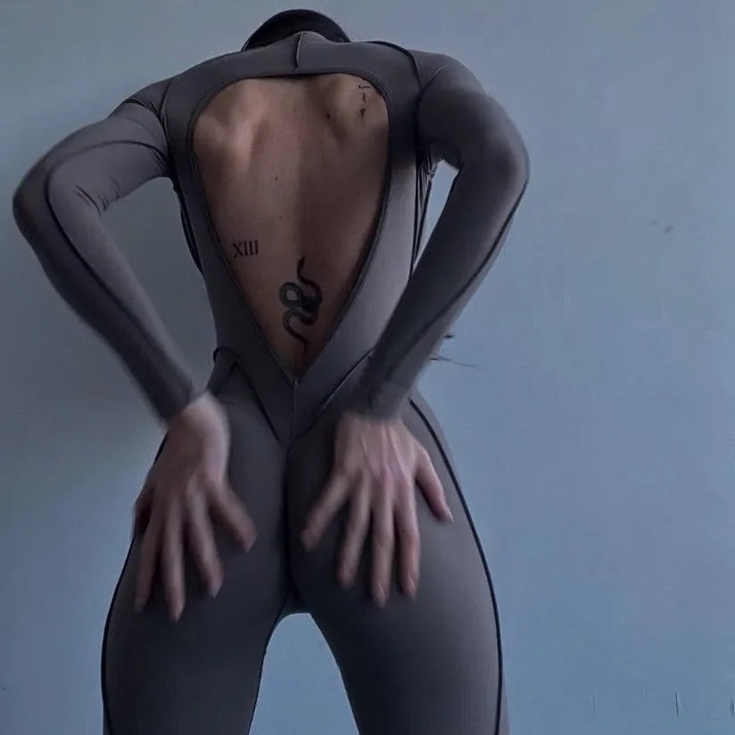 Backless figure-hugging jumpsuit for an evening look.