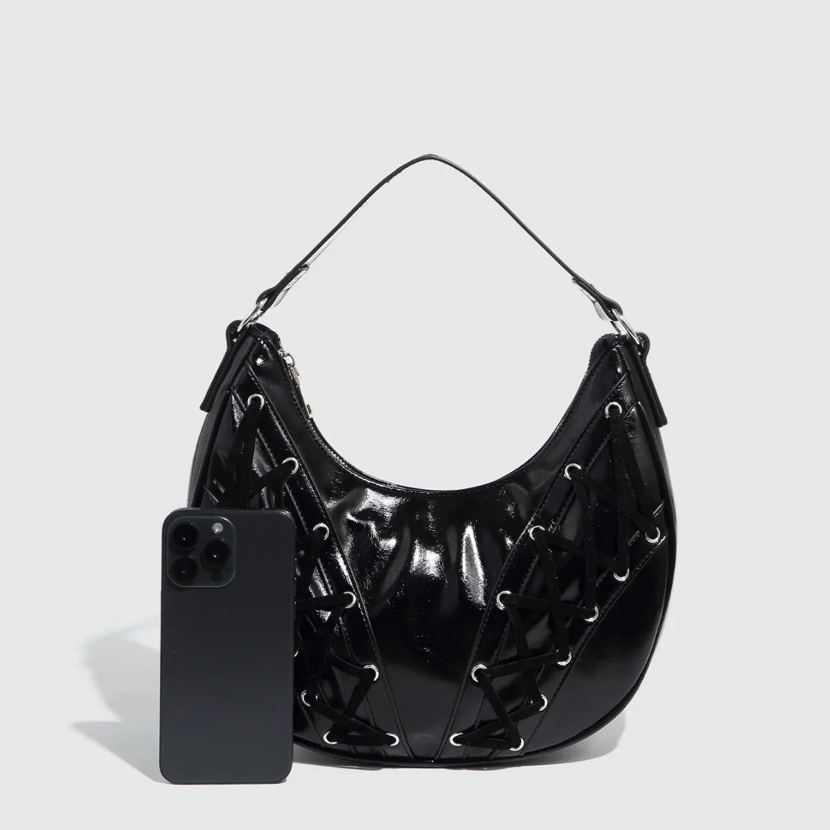 black patent leather bag with lace-up detail