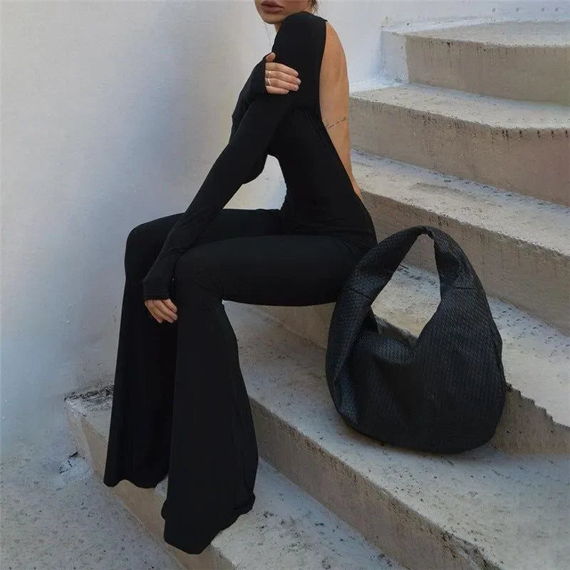 black backless jumpsuit with flared legs, evening wear