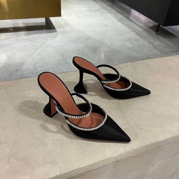 black pointed-toe heels with crystal straps, evening look