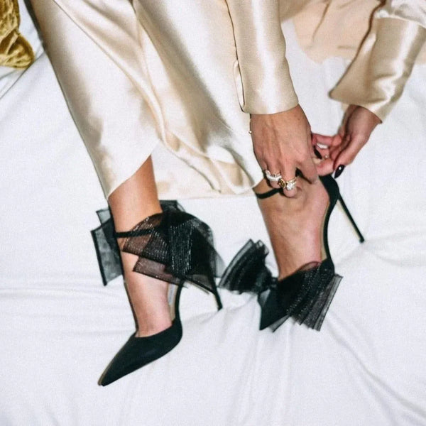 black mesh bow heels with pointed toe, evening wear